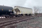 TILX 328535 ends the empty oil can train.